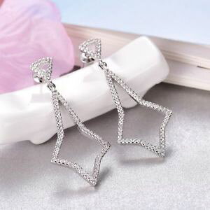 yzANZT[@lbNX@kzCgS[hTt@CAKXy_gCONA18k oro bianco chiaro vetro zaffiro stella orecchini pendenti 222