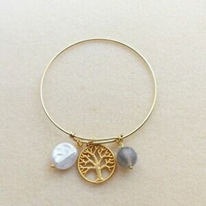 yzANZT[@lbNX@p[AK^VtgS[hg[TeJtS[hg[bracciale tono oro con perla agata e albero tono oro satin