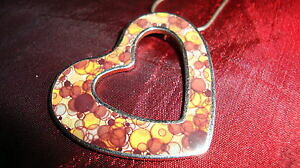 yzANZT[@lbNX@lbNXy_gcollana e ciondolo interamente in argento a cuore con bella decorazione colorata