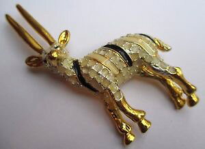 yzANZT[@lbNX@gK[x[Wm[grande broche bijou rtro gazelle couleur or mail beige noir 2276