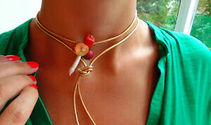 yzANZT[@lbNX@lbNXAK^r[`[NXLOlbNXcollare collana choker pelle collana lunga con preziose agata, di catia levy