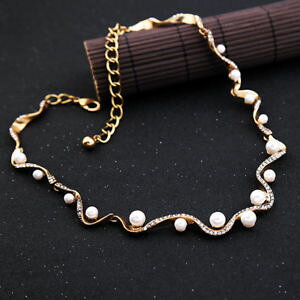 yzANZT[@lbNX@RA[A[fRuIWicollier court dor art deco serpent pav perle blanc original osc5