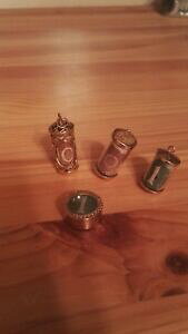 yzlbNX@49cty_gm[gfour 9ct gold pendants containing old money notes, all hallmarked