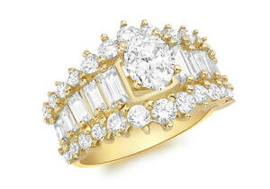 �y���������z�l�b�N���X�@�C�G���[�S�[���h�I�[�o���o�Q�b�g�N���X�^�����O9ct yellow gold oval and baguette stone cluster ring