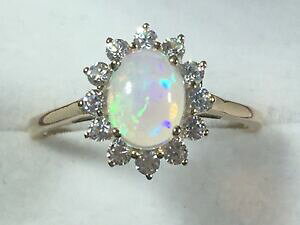 yzlbNX@S[hfB[XIp[zCgTt@CANX^Olarge 9ct gold ladies opal white sapphire cluster ring
