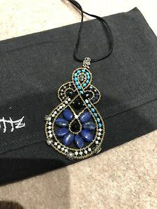 yzlbNX@y_gfUCi[semi precious stone pendant designer name is ziio