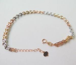 yzlbNX@}`g[S[htFU[NuXbg pure 18k multitone gold feather link bracelet 185cm au750