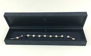yzlbNX@CG[S[hp[uXbg9ct yellow gold pearl bracelet retailed by beaverbrooks 20cm in length