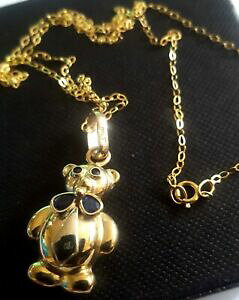 yzlbNX@y_gTt@CAS[h`F[{bNXpendant 9 ctgold quality bear with sapphire eyes and bow 9ct gold chain boxed