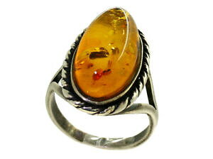 yzlbNX@J{VI[oIWVo[O470cts cabochon oval amber ring set in silver