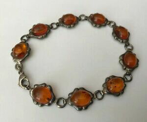 yzlbNX@hmX^[O925RjbNJ{Voghm sterling silver 925 cognac honey amber oval cabochon baltic amber bracelet