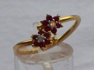 yzlbNX@S[hr[zCgTt@CAfB[XNXO22ct gold ruby white sapphire ladies crossover ring