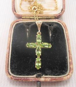yzlbNX@yhbgNX`F[CG[S[ha pretty peridot cross amp; chain in 9ct yellow gold