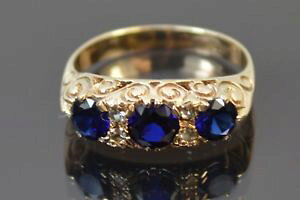 yzlbNX@S[hTt@CAOTCY9ct gold amp; sapphire amp; white stone ring *size o*