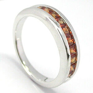 yzlbNX@IWTt@CAzCgS[hO 116ct orange sapphire 9ct white gold eternity ring