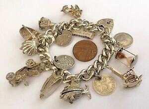 yzlbNX@78gmBe[Wfantastic ladies very heavy vintage solid silver charm bracelet 78 gm beautiful