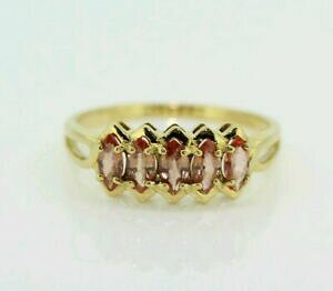 yzlbNX@18ctCF[S[hsNTt@CAG^jeB[O18ct yellow gold pink sapphire eternity ring