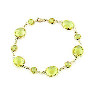 yzlbNX@gp[Y75C`14kCF[S[h14k yellow gold gemstone bracelet with oval and round lemon topaz 75 inches