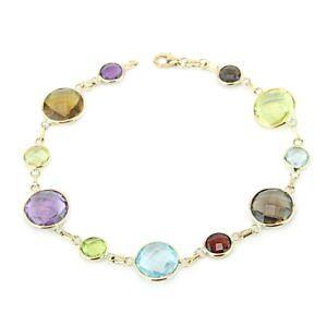 yzlbNX@CG[S[huXbgEh}`J[C`14k yellow gold bracelet with round shaped multi color gemstones 8 inches