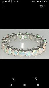 yzlbNX@zCgS[hIp[O9ct white gold, fire opal eternity ring