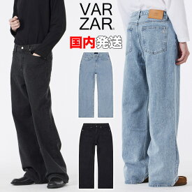 バザール デニムパンツ VARZAR Signature Stud Wide Fit Denim Pants ロゴ ワイド オーバーサイズ ユニセックス 韓国 K-POP 芸能人 アイドル愛用 メンズ レディース 正規品 [衣類]