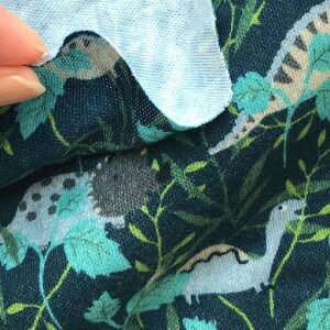 ドイツ オーガニック コットン ニット 森の中の恐竜たち ティラノサウルス ファブリック カットクロス 子ども キッズ柄 20cm 単位 切り売り