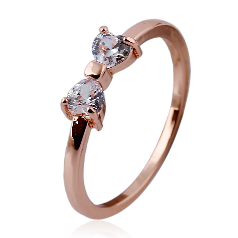 透明感のある美しい光沢が指先をスタイリッシュに 指輪 リング レディース K18金RGP 女子 可愛い リボン彩石 ダイヤモンドCZ 金属アレルギー 販売 開店祝い
