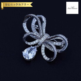 【全品70%OFFクーポン 先着500名様 ラストスパート＆アフターセール】【30日返品保証】 ブローチ キュービックジルコニア ホワイト 真鍮 シルバー 揺れる ゆれる おしゃれ 可愛い かわいい きれいめ モチーフ りぼん リボン x16110133