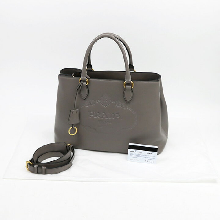 楽天市場】【美品】プラダ 【PRADA】 ロゴエンボス レザー トップ 