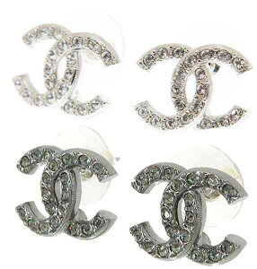 CHANEL ANZT[Vl sAXCC}[N RR}[NK^ubN Vo[CXg[CC NAItzCg×S[h ubN×Vo[GRAY CRYSTAL SILVER PIERCE NB559SLNB556GUN]