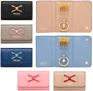 PRADA �v���_ �L�[�����O�t���c�[�g�����{�� 4�A�L�[�P�[�X���^�����S �T�t�B�A�m���U�[�u���b�N �l�C�r�[ �s���N �s���N�x�[�W���V�����p���V���o�[ �S�[���h SAFFIANOMETALBOW�T�t�B�A�[�m�L�[