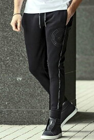 【40%OFFセール】1piu1uguale3 RELAX ウノピゥウノウグァーレトレ リラックス サークルロゴパイピングロングパンツ{USB-24026-BLK-BDS}