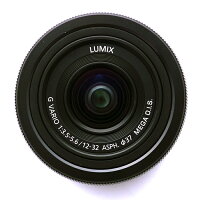 《新品》Panasonic（パナソニック）LUMIXGVARIO12-32mmF3.5-5.6ASPH.MEGAO.I.S.H-FS12032ブラック【ミクロディア巾着＆Wリアキャップセットプレゼント】[Lens|交換レンズ]