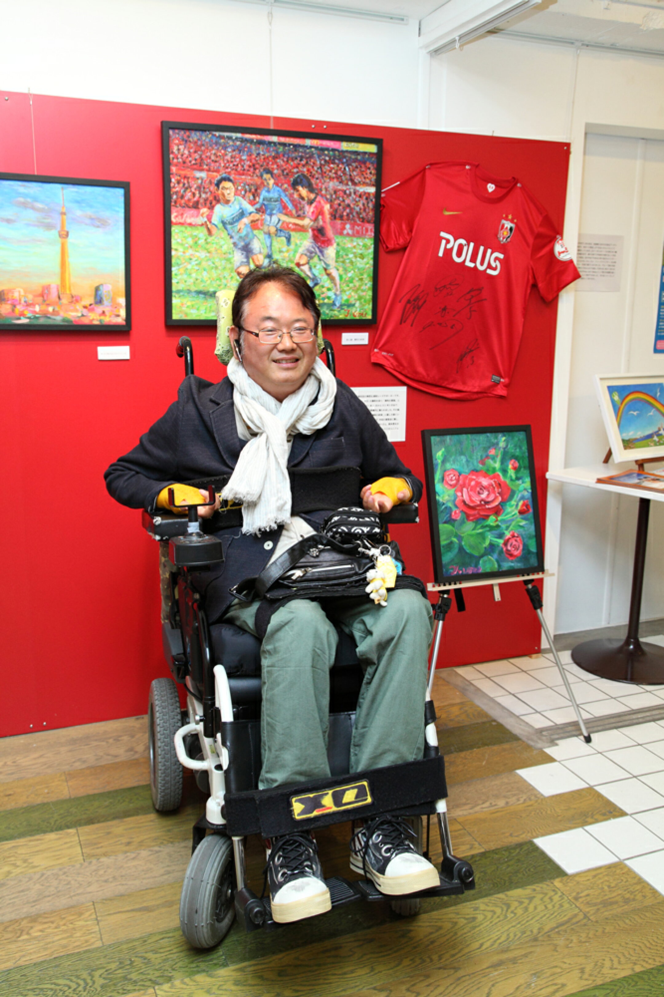 原宿での5人展会場にて 口で描く画家 梅宮俊明