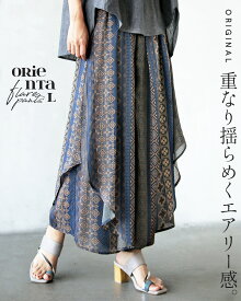 otonaオリジナル パンツ ワイド フレア ほどよく個性を引き立てる 揺らめくエアリーフレアパンツ ネイビー 春 夏 秋 冬 春夏 秋冬 シアー レイヤード エアリー エレガント ストライプ 柄 エスニック オリエンタル ゆったり きれいめ 3/2[N8]