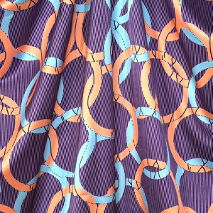 【140cm幅x50cm単位】ポリエステルシルキーサテン アフリカンプリント柄 布 生地 AP-1084 オリンピア パステルオレンジ ブルー 地色パープル ハンドメイド 手芸材料 ワンピース スカート 裏地