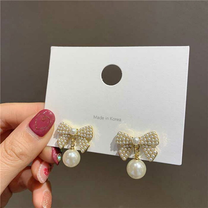 楽天市場 当日出荷 イヤリング リボン パール フレンチガーリー ジルコニア キラキラ おしゃれ かわいい 可愛い 学生 高校生 ゴールド 中学生 ホワイト つけっぱなし レディース 小さめ 落ちない 韓国 パールリボン パールイヤリング 雑貨 韓国雑貨のpinkcarrot 楽天市場 当日出荷 イヤリング リボン パール フレンチガーリー ジルコニア キラキラ おしゃれ かわいい 可愛い 学生 高校生 ゴールド 中学生 ホワイト つけっぱなし レディース 小さめ 落ちない 韓国 パールリボン パールイヤリング 雑貨 韓国雑貨のpinkcarrot