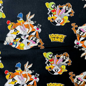 生地 綿100% ルーニー・テューンズ 【50cm以上10cm単位】 16473 布 トゥィーティー バッグスバニー 布地 キャラクター生地 入園 入学 入園準備 入学準備 綿 コットン 手作り 手芸 ハンドメイド