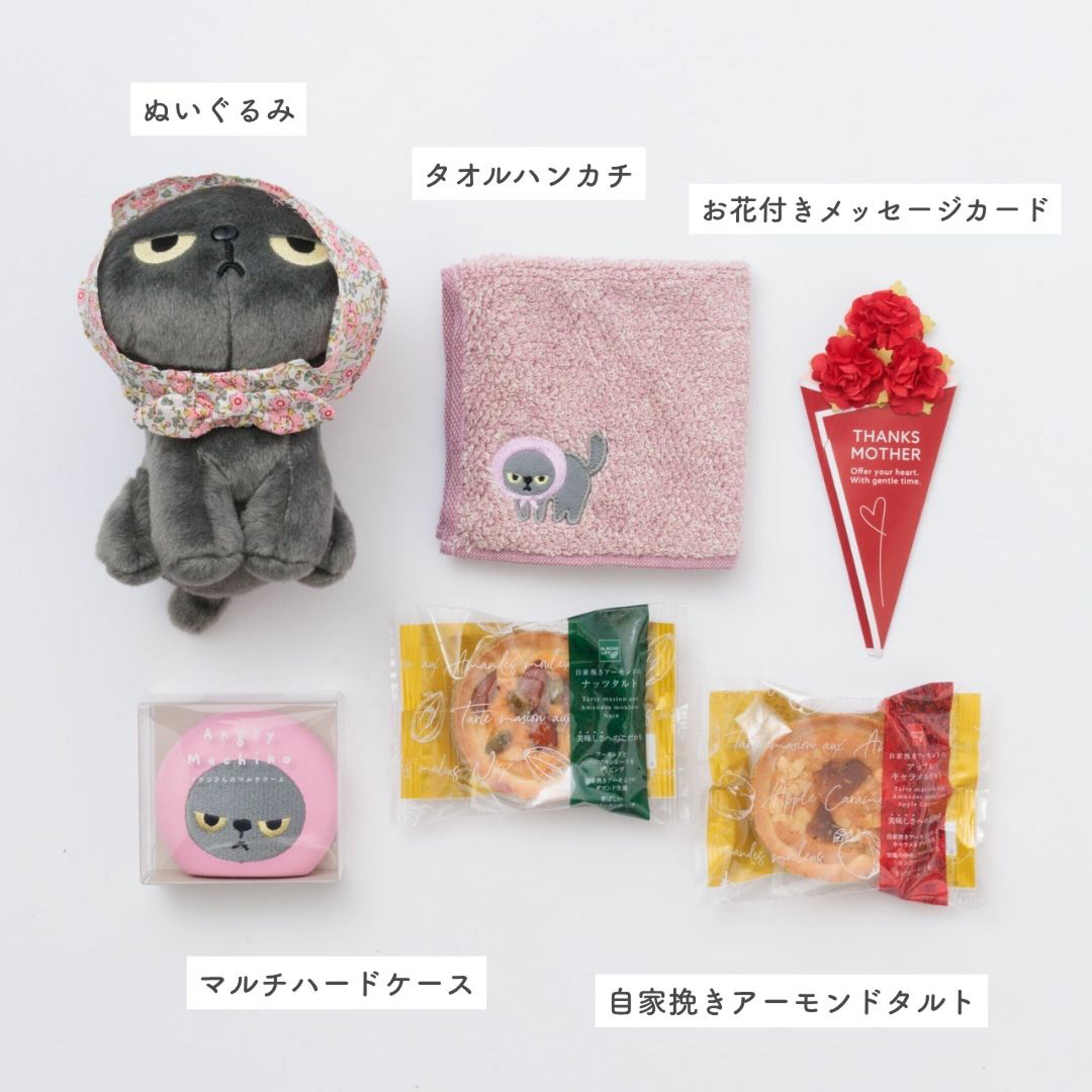 5980円ギフトセット②は、アングリーマチコのぬいぐるみ＆マルチケース＆ハンカチ、スイーツセット。人気の花柄スカーフ付きマチコさんぬいぐるみとお出かけに便利なケースと刺繍ハンカチ。猫好きのお母さんにおすすめしたい、遊び心満載の母の日プレゼントです。