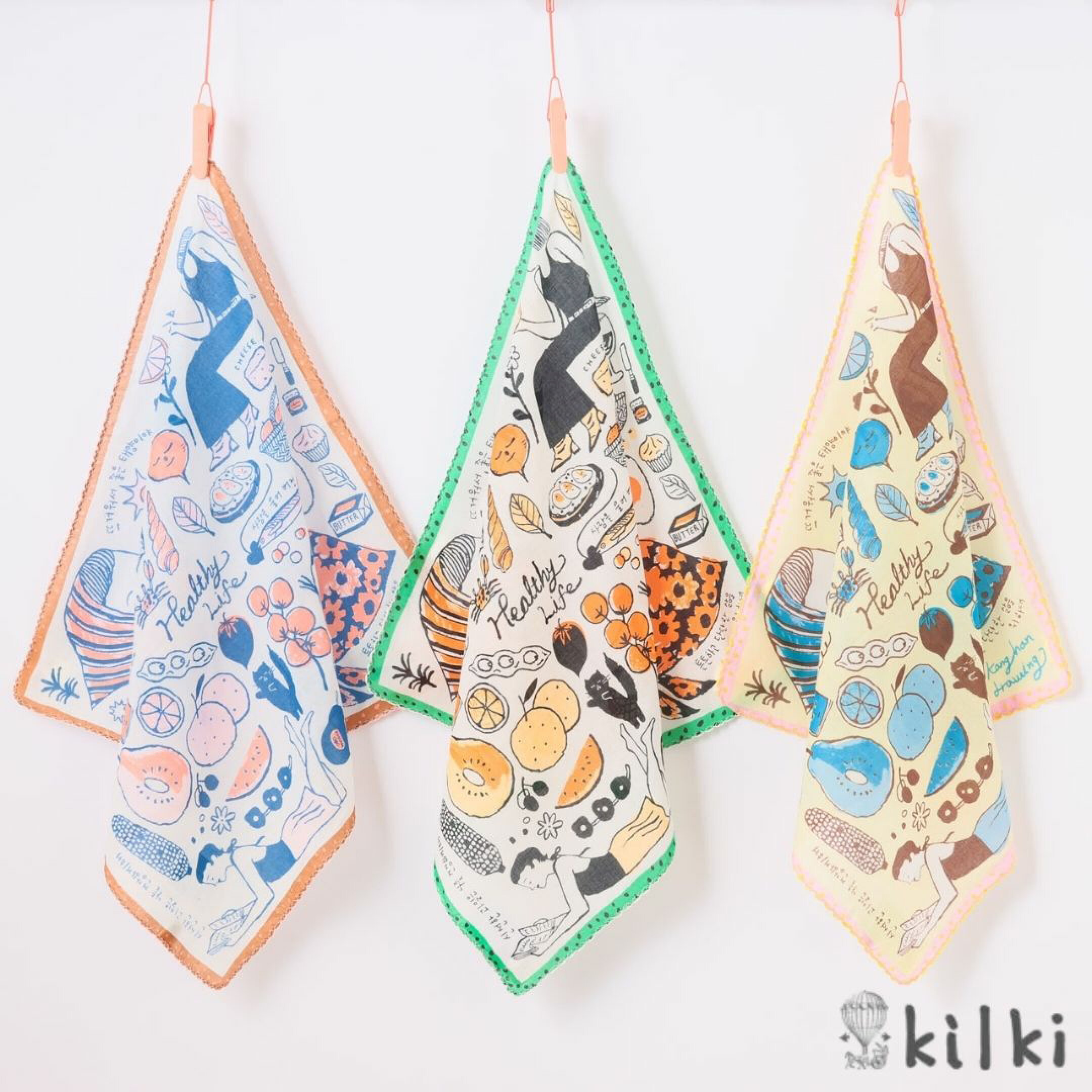 ブランドKILKI（キルキー）の大判コットンハンカチ特集。「ヘルシーライフ」は日常の小さな幸せをイメージしたデザイン。韓国ライクなイラストでおしゃれに持ち歩けます。ドット柄のフチもアクセントに。トレンド感があり、年齢問わずギフトとして贈りやすいハンカチ。