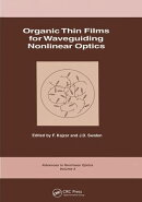 Organic Thin Films for Waveguiding Nonlinear Optics