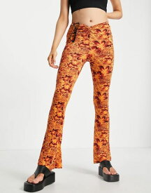 トップショップ レディース カジュアルパンツ ボトムス Topshop knot twist front flared pants in hibiscus print Multi