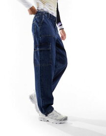 【送料無料】 エイソス メンズ デニムパンツ ボトムス ASOS DESIGN baggy jeans with cargo pockets in dark wash blue Dark wash blue