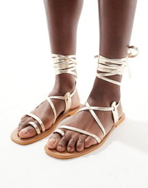 【送料無料】 エイソス レディース サンダル シューズ ASOS DESIGN Finland leather strappy toe-loop flat sandals in gold GOLD