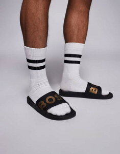 yz {X IW Y T_ V[Y BOSS Aryeh contrast logo slider in black and gold Black