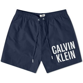 【送料無料】 カルバンクライン メンズ ハーフパンツ・ショーツ 水着 Calvin Klein Large Logo Swim Short Navy Iris
