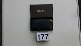 【中古】長財布　黒色革製　男性用　GUCCI　M77545　チャック式　ミッキーマウスストラップ付　箱入り　格安提供