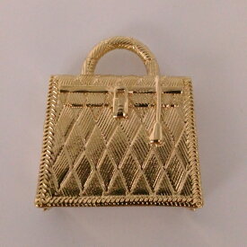 【未使用展示品】エルメス HERMES カデナ 【キュリオジテ】 ケリー チャーム ペンダント トップ 。ケリーバッグモチーフのゴールド カデナ チャームで貴方のバッグにチャームとしてチェーンと合わせてペンダントップやキーホルダーに!!【未使用品】【レア物】