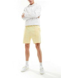 エイソス ASOS DESIGN slim pique shorts in pastel yellow メンズ