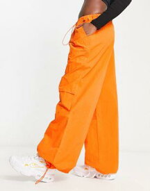 エイソス ASOS DESIGN parachute cargo trouser in orange レディース